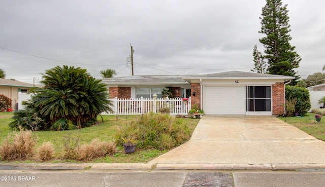 ranch-style home with concrete driveway, brick siding, an attached garage, and fence