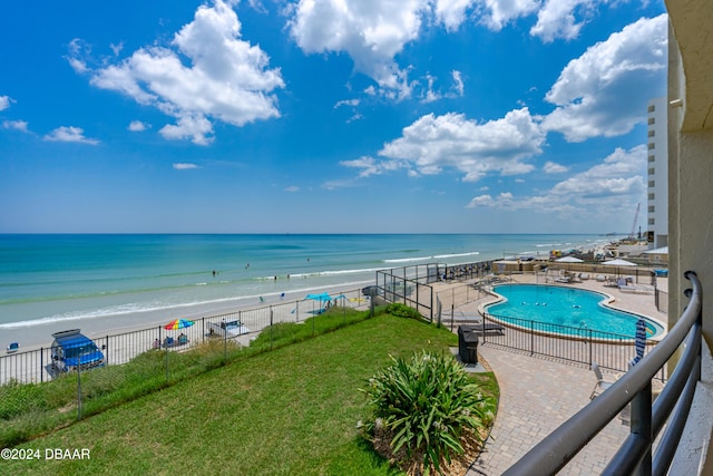 view of water feature with a beach view