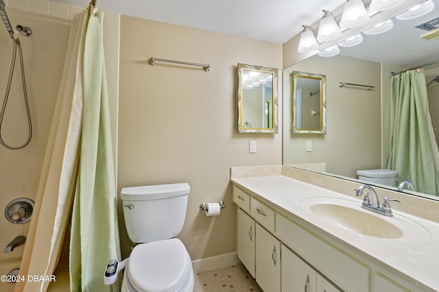 bathroom with vanity, toilet, tile patterned floors, and a shower with shower curtain