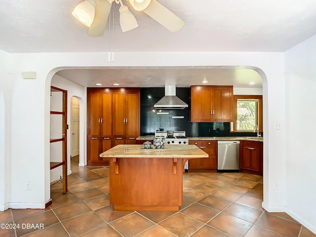 kitchen featuring decorative backsplash, wall chimney exhaust hood, a kitchen island, stainless steel dishwasher, and a sink