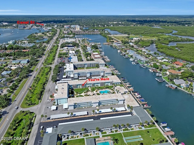 325 Causeway Cswy N Unit D104, New Smyrna Beach, FL 32169 - drone / aerial view featuring a water view