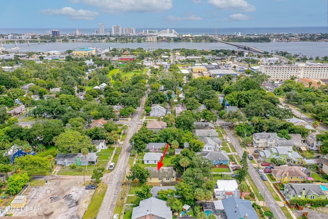 birds eye view of property featuring a water view