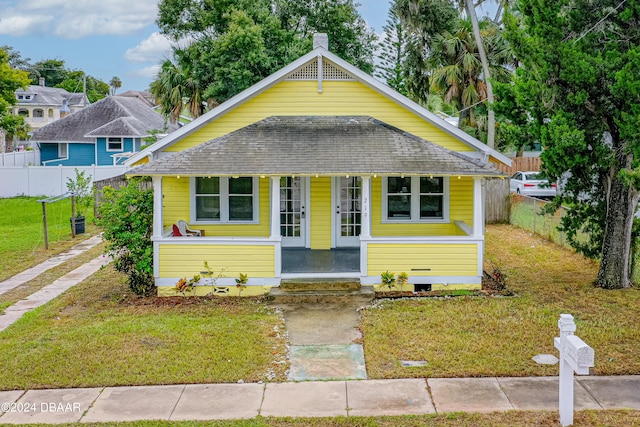 bungalow with a front yard