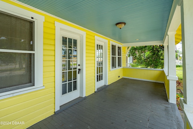 wooden deck featuring covered porch