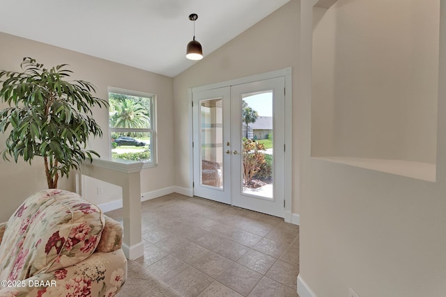 1329 Sunningdale Ln, Ormond Beach, FL 32174 - doorway to outside featuring french doors, vaulted ceiling, and light tile patterned flooring