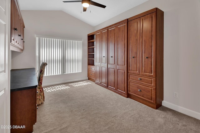 1329 Sunningdale Ln, Ormond Beach, FL 32174 - unfurnished bedroom with lofted ceiling, carpet floors, and a ceiling fan