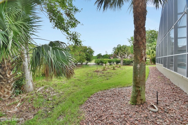 1329 Sunningdale Ln, Ormond Beach, FL 32174 - view of grassy yard with a lanai
