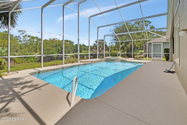 1329 Sunningdale Ln, Ormond Beach, FL 32174 - view of swimming pool featuring a patio, a pool with connected hot tub, and a lanai