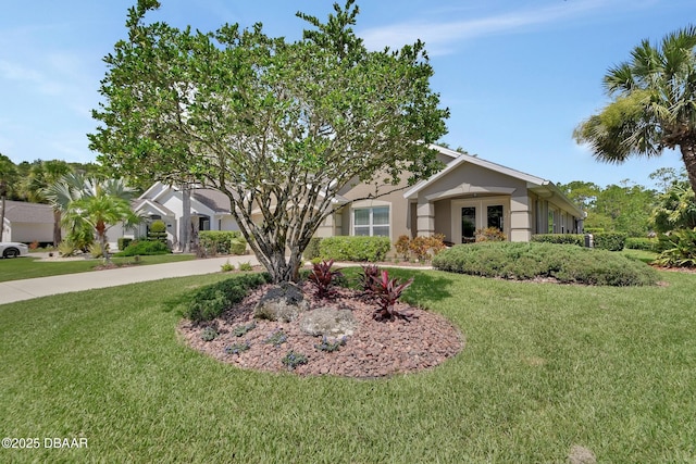 1329 Sunningdale Ln, Ormond Beach, FL 32174 - view of front of property with a front yard and stucco siding