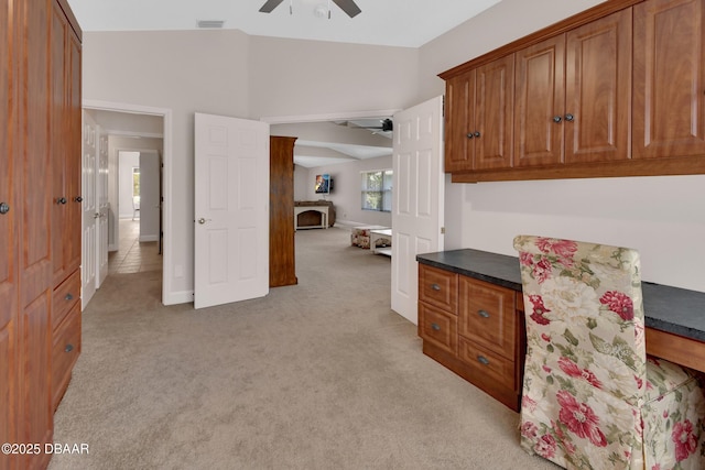 1329 Sunningdale Ln, Ormond Beach, FL 32174 - office area with ceiling fan, light colored carpet, and lofted ceiling