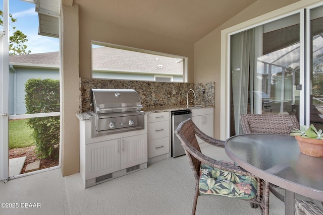 1329 Sunningdale Ln, Ormond Beach, FL 32174 - view of patio / terrace featuring an outdoor kitchen and a sink
