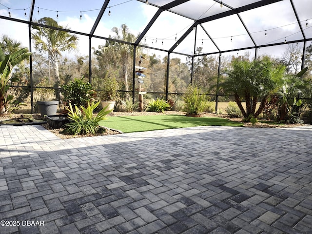 894 Attitude Ave, Daytona Beach, FL 32124 - view of patio / terrace with glass enclosure