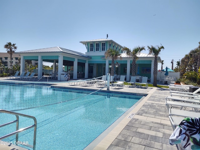 view of swimming pool featuring a gazebo and a patio area