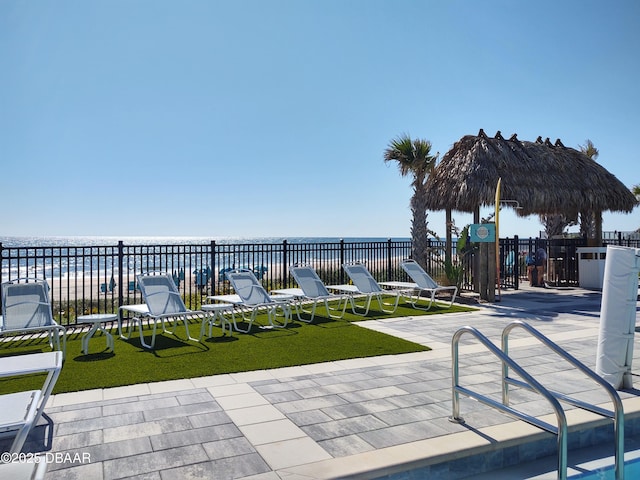 894 Attitude Ave, Daytona Beach, FL 32124 - view of patio / terrace featuring a water view