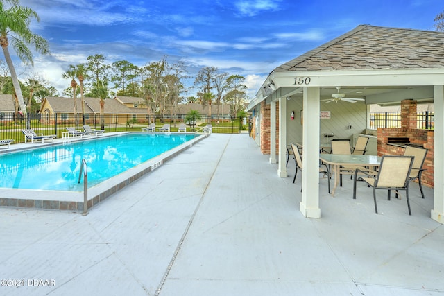 view of pool featuring a gazebo, a patio area, and ceiling fan