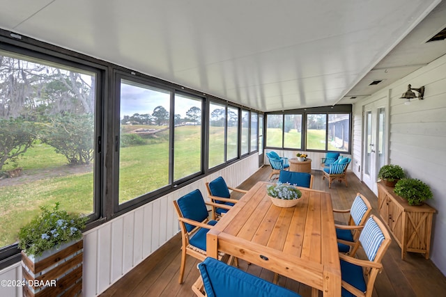 sunroom / solarium with vaulted ceiling and plenty of natural light