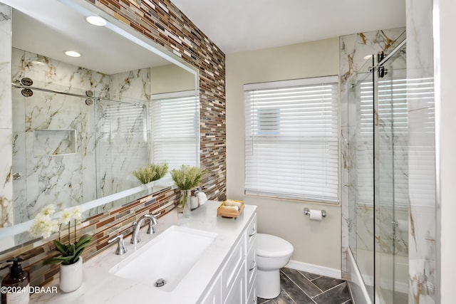 bathroom with toilet, vanity, wood-type flooring, and a shower with shower door