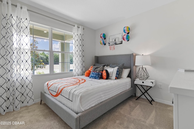 bedroom featuring light colored carpet