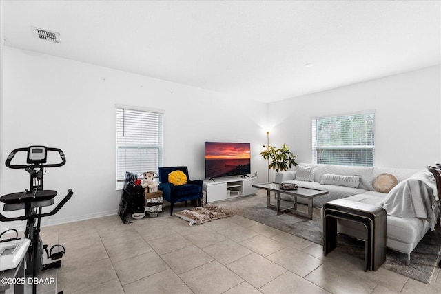 1223 Cabot Cliffs Dr, Daytona Beach, FL 32124 - living room featuring light tile patterned flooring and visible vents