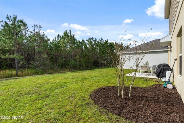 1223 Cabot Cliffs Dr, Daytona Beach, FL 32124 - view of yard with a patio area