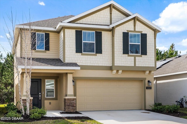 1223 Cabot Cliffs Dr, Daytona Beach, FL 32124 - view of front facade with concrete driveway, an attached garage, roof with shingles, and stucco siding