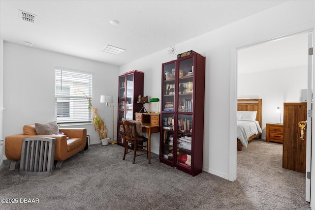 1223 Cabot Cliffs Dr, Daytona Beach, FL 32124 - living area featuring carpet flooring, baseboards, and visible vents
