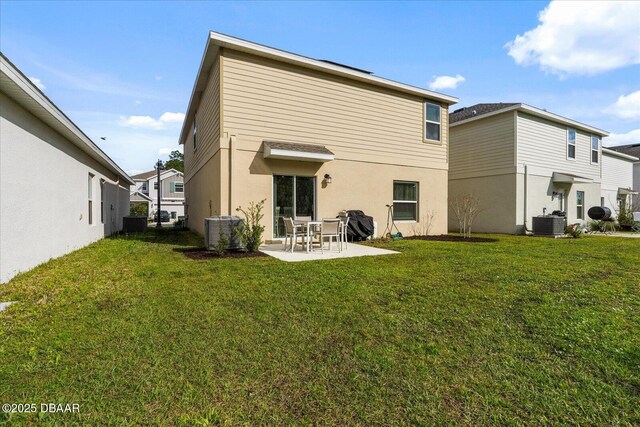 1223 Cabot Cliffs Dr, Daytona Beach, FL 32124 - rear view of house with a yard, a patio, and cooling unit