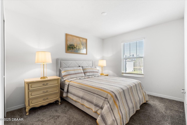 1223 Cabot Cliffs Dr, Daytona Beach, FL 32124 - bedroom featuring baseboards and dark carpet