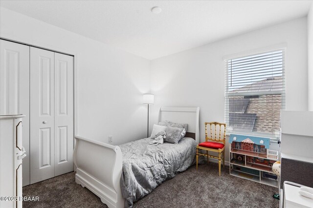 1223 Cabot Cliffs Dr, Daytona Beach, FL 32124 - bedroom featuring a closet and carpet flooring