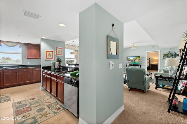 kitchen featuring dishwasher, ceiling fan, a healthy amount of sunlight, and sink