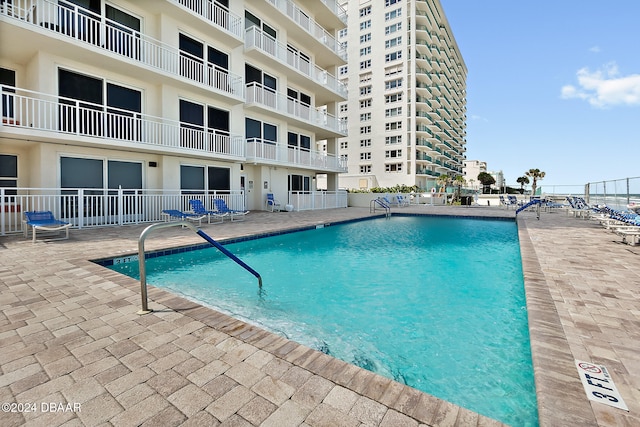 view of pool with a patio area