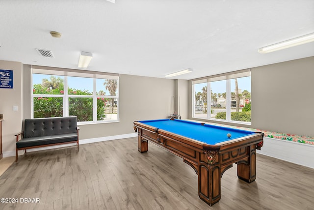 recreation room featuring a wealth of natural light, wood-type flooring, and pool table