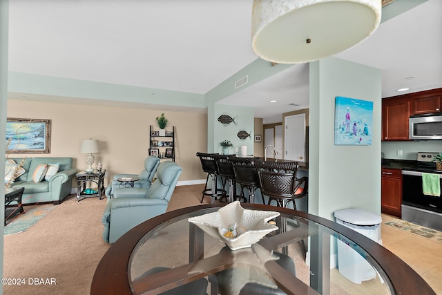 interior space with carpet flooring and sink