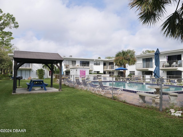 1508 Virginia Ave Unit 103, Daytona Beach, FL 32114 - community pool with a gazebo and a lawn