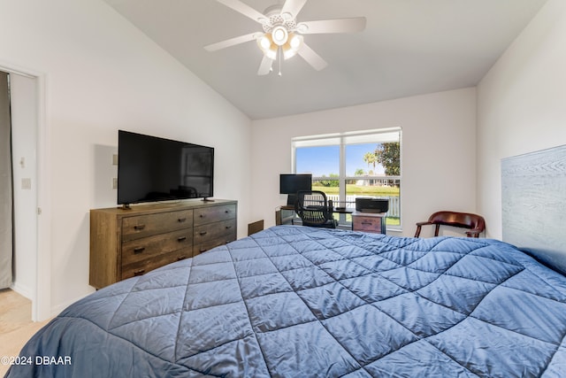 bedroom featuring ceiling fan and vaulted ceiling