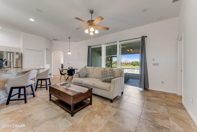 living room with ceiling fan