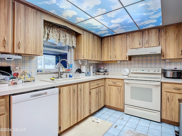 kitchen featuring tasteful backsplash, sink, white appliances, and light tile patterned flooring