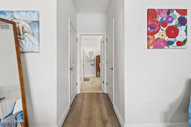 hallway featuring hardwood / wood-style floors