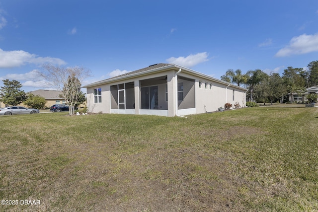 back of house with a yard