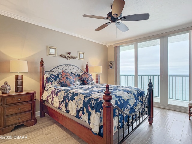 bedroom with access to outside, a water view, ornamental molding, ceiling fan, and light wood-type flooring