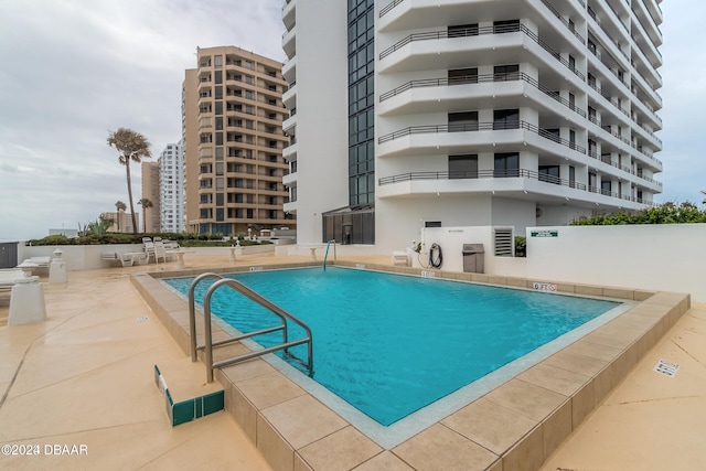 view of pool with a patio