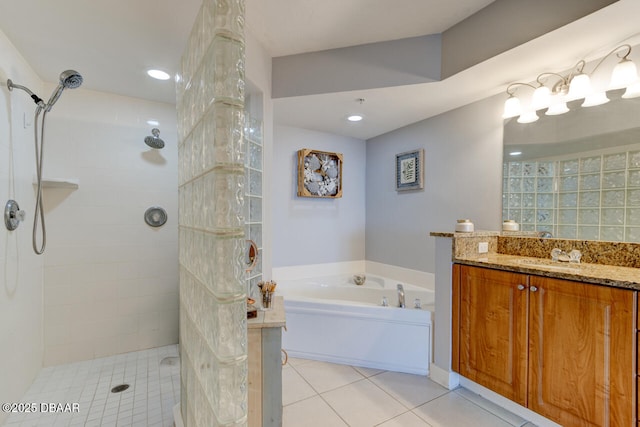 bathroom featuring tile patterned floors, plus walk in shower, and vanity