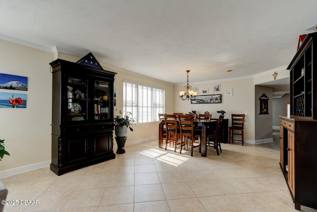 tiled dining room featuring crown molding and a chandelier