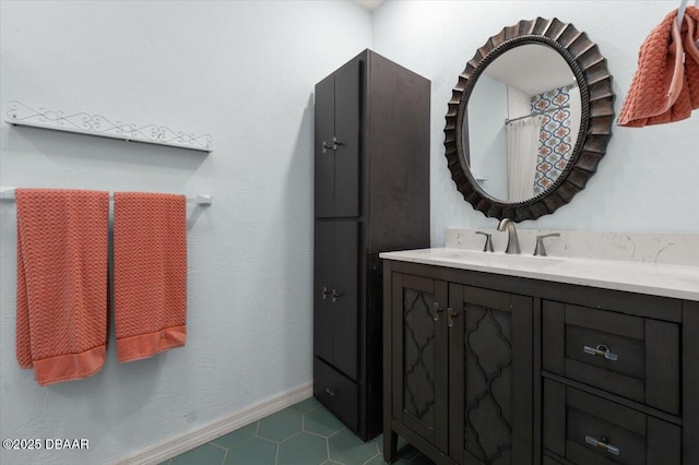 217 Royal Dunes Cir, Ormond Beach, FL 32176 - full bath with vanity, tile patterned flooring, and baseboards
