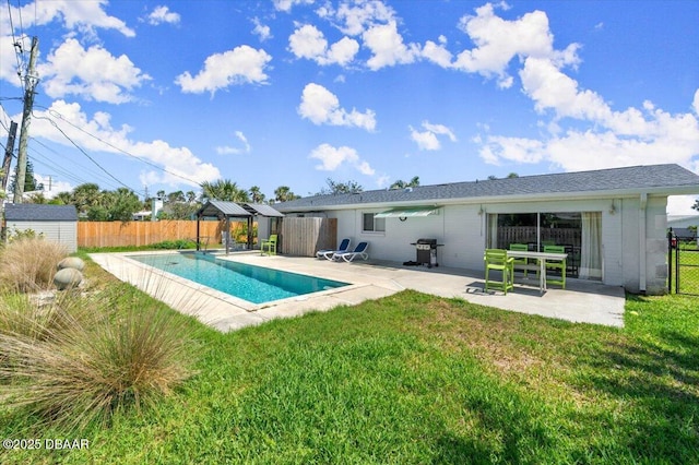 217 Royal Dunes Cir, Ormond Beach, FL 32176 - rear view of property featuring a gazebo, a patio, and an outbuilding