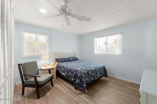 217 Royal Dunes Cir, Ormond Beach, FL 32176 - bedroom featuring wood finished floors, baseboards, and ceiling fan