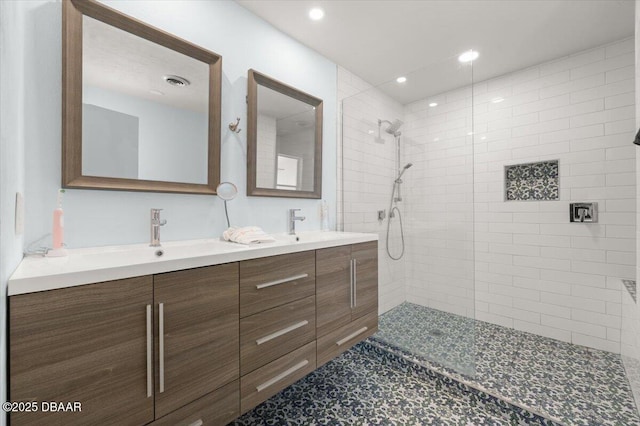 217 Royal Dunes Cir, Ormond Beach, FL 32176 - full bathroom featuring tiled shower, double vanity, and recessed lighting