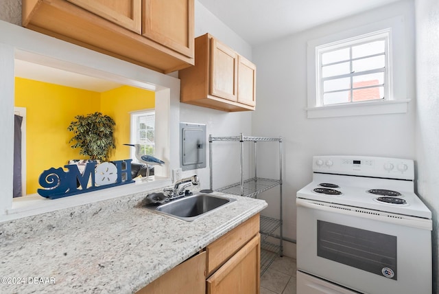 kitchen with electric panel, light stone counters, sink, light tile patterned floors, and electric range