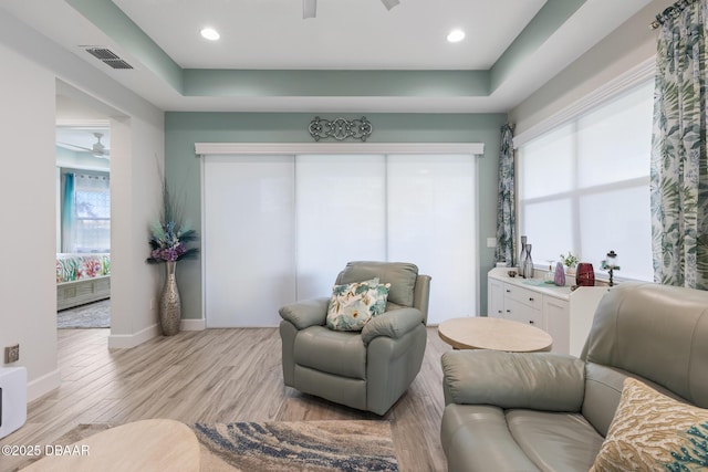 418 Good Life Way, Daytona Beach, FL 32124 - living area with ceiling fan and light hardwood / wood-style floors