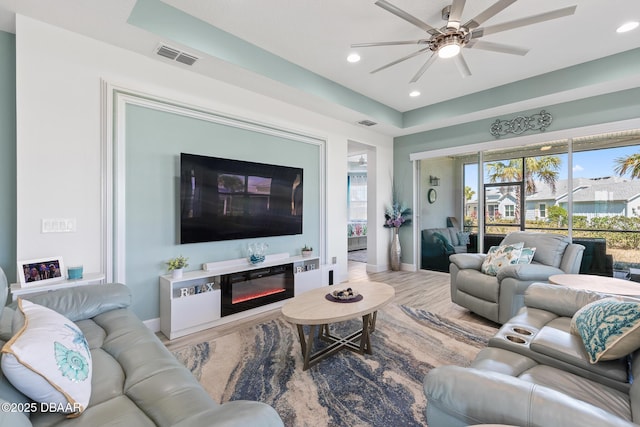 418 Good Life Way, Daytona Beach, FL 32124 - living room featuring ceiling fan and light wood-type flooring